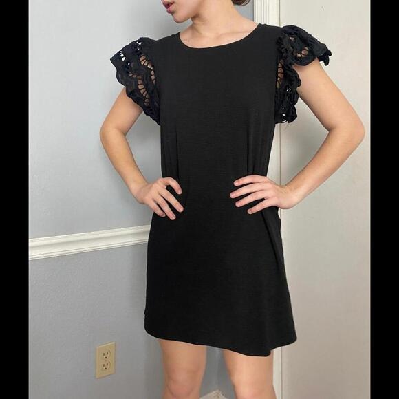 Joy Joy Chic Black Dress with Unique Lace Sleeves - Picture 2 of 11